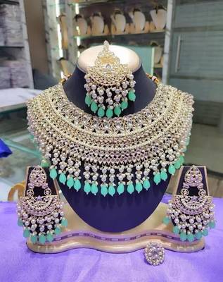 Opulent bridal kundan choker set with mint beads and matching earrings & maang tikka 1