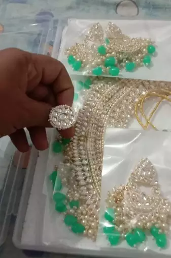 Opulent bridal kundan choker set with mint beads and matching earrings & maang tikka