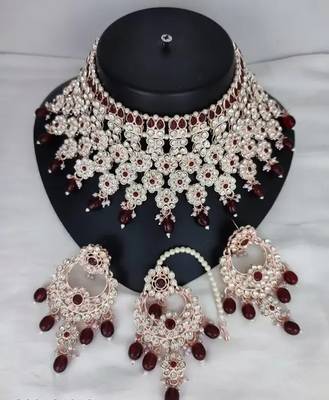 Luxurious silver-plated bridal jewelry set with ruby red accents 1