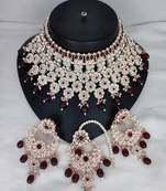 Luxurious silver-plated bridal jewelry set with ruby red accents