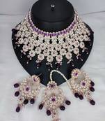 Luxurious silver-plated bridal jewelry set with purple accents