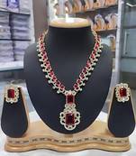 Elegant red and silver statement necklace set with matching earrings