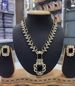 Elegant black and silver statement necklace set with matching earrings