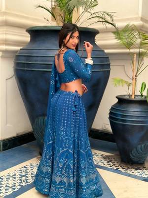 Traditional blue lehenga choli with embroidered and georgette dupatta 4