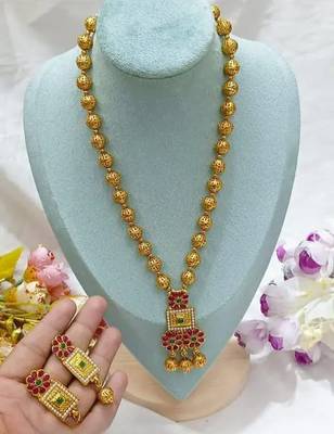 Elegant gold beaded necklace set with ruby and emerald pendant 1