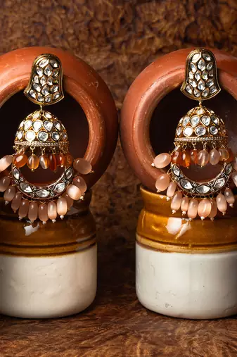 Nawabi polki chaandbali jhumkaas dazzling in jewels embedded in a polki and diamond finish with a touch