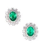Leafy lustre ovals Diamonds encrusted with semi precious emerald stones in a classic finish for everything fantaisie.