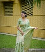 Green raw silk zari weaving saree festive wear