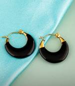  gold-toned hoop earrings with half-black design     modern minimalist aesthetic with striking contrast