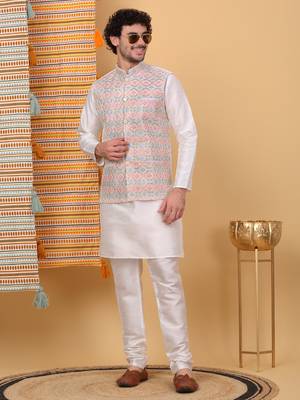 Silk blend cream kurta and churidar with embroidered cream nehru jacket 1