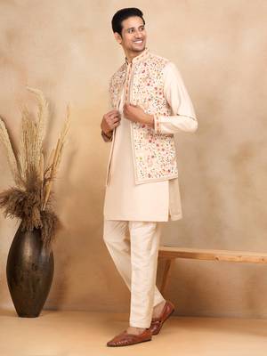 Cotton silk embroidered beige kurta and trouser with floral embroidered beige nehru jacket 1