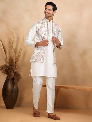 Cotton silk embroidered cream kurta and trouser with floral embroidered cream nehru jacket 1