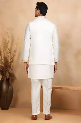 Cotton silk embroidered cream kurta and trouser with floral embroidered cream nehru jacket