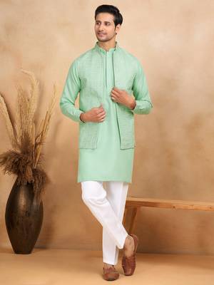 Cotton green kurta and trouser with embroidered green nehru jacket 1