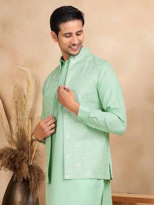 Cotton green kurta and trouser with embroidered green nehru jacket 2