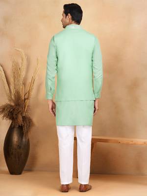 Cotton green kurta and trouser with embroidered green nehru jacket 3