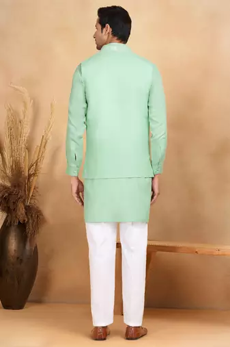 Cotton green kurta and trouser with embroidered green nehru jacket