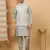 Silk blend olive green kurta and churidar with embroidered light green nehru jacket