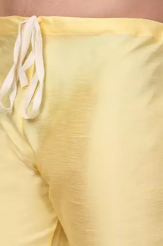 Silk blend lime yellow kurta and churidar with embroidered lime yellow nehru jacket