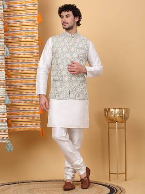 Silk blend cream kurta and churidar with embroidered light green nehru jacket 1