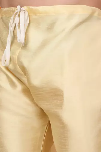 Silk blend beige kurta and churidar with ethnic motifs mustard nehru jacket