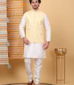 Silk blend cream kurta and churidar with embroidered lime yellow nehru jacket