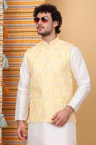 Silk blend cream kurta and churidar with embroidered lime yellow nehru jacket