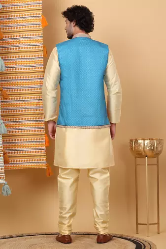 Silk blend beige kurta and churidar with ethnic motifs blue nehru jacket