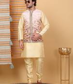 Silk blend beige kurta and churidar with floral printed beige nehru jacket