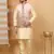Silk blend beige kurta and churidar with floral printed beige nehru jacket