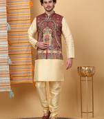 Silk blend beige kurta and churidar with paisley printed maroon nehru jacket