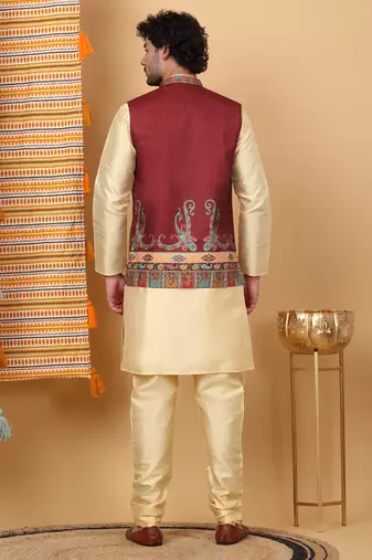 Silk blend beige kurta and churidar with paisley printed maroon nehru jacket