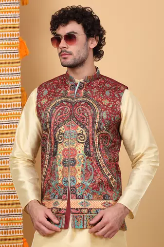 Silk blend beige kurta and churidar with paisley printed maroon nehru jacket