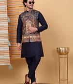 Silk blend navy blue kurta and churidar with paisley printed navy blue nehru jacket