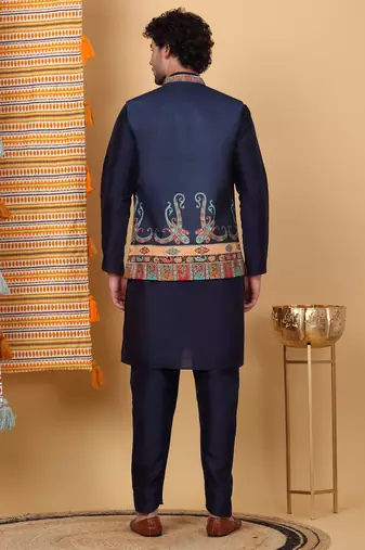 Silk blend navy blue kurta and churidar with paisley printed navy blue nehru jacket