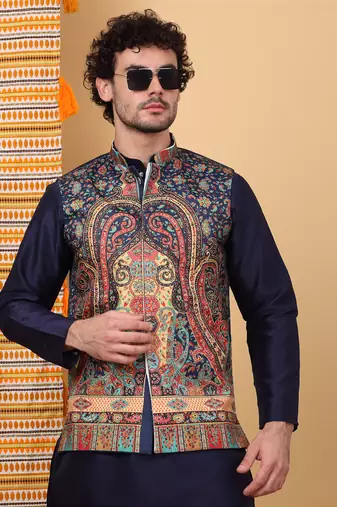 Silk blend navy blue kurta and churidar with paisley printed navy blue nehru jacket