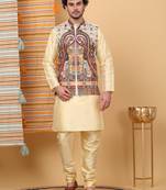 Silk blend beige kurta and churidar with paisley printed cream nehru jacket