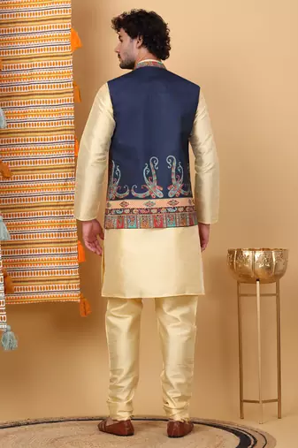Silk blend beige kurta and churidar with paisley printed navy blue nehru jacket