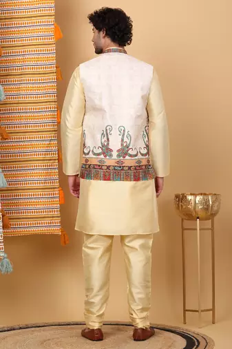 Silk blend beige kurta and churidar with paisley printed cream nehru jacket