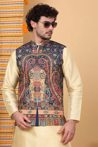 Silk blend beige kurta and churidar with paisley printed navy blue nehru jacket