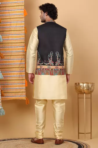Silk blend beige kurta and churidar with paisley printed black nehru jacket