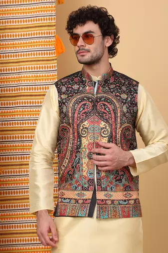 Silk blend beige kurta and churidar with paisley printed black nehru jacket