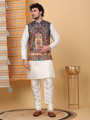 Silk blend cream kurta and churidar with paisley printed navy blue nehru jacket 1