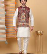 Silk blend cream kurta and churidar with paisley printed maroon nehru jacket