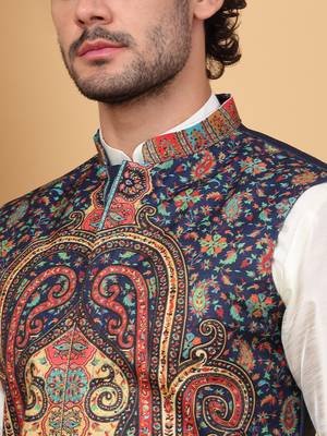 Silk blend cream kurta and churidar with paisley printed navy blue nehru jacket 2
