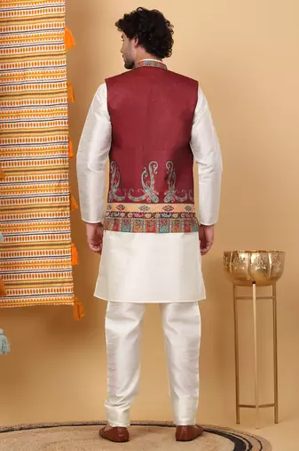 Silk blend cream kurta and churidar with paisley printed maroon nehru jacket