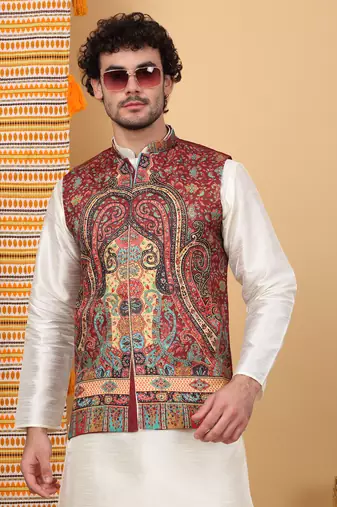 Silk blend cream kurta and churidar with paisley printed maroon nehru jacket