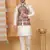 Silk blend cream kurta and churidar with paisley printed cream nehru jacket