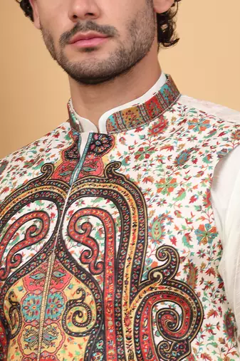 Silk blend cream kurta and churidar with paisley printed cream nehru jacket