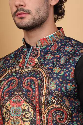 Silk blend black kurta and churidar with paisley printed navy blue nehru jacket